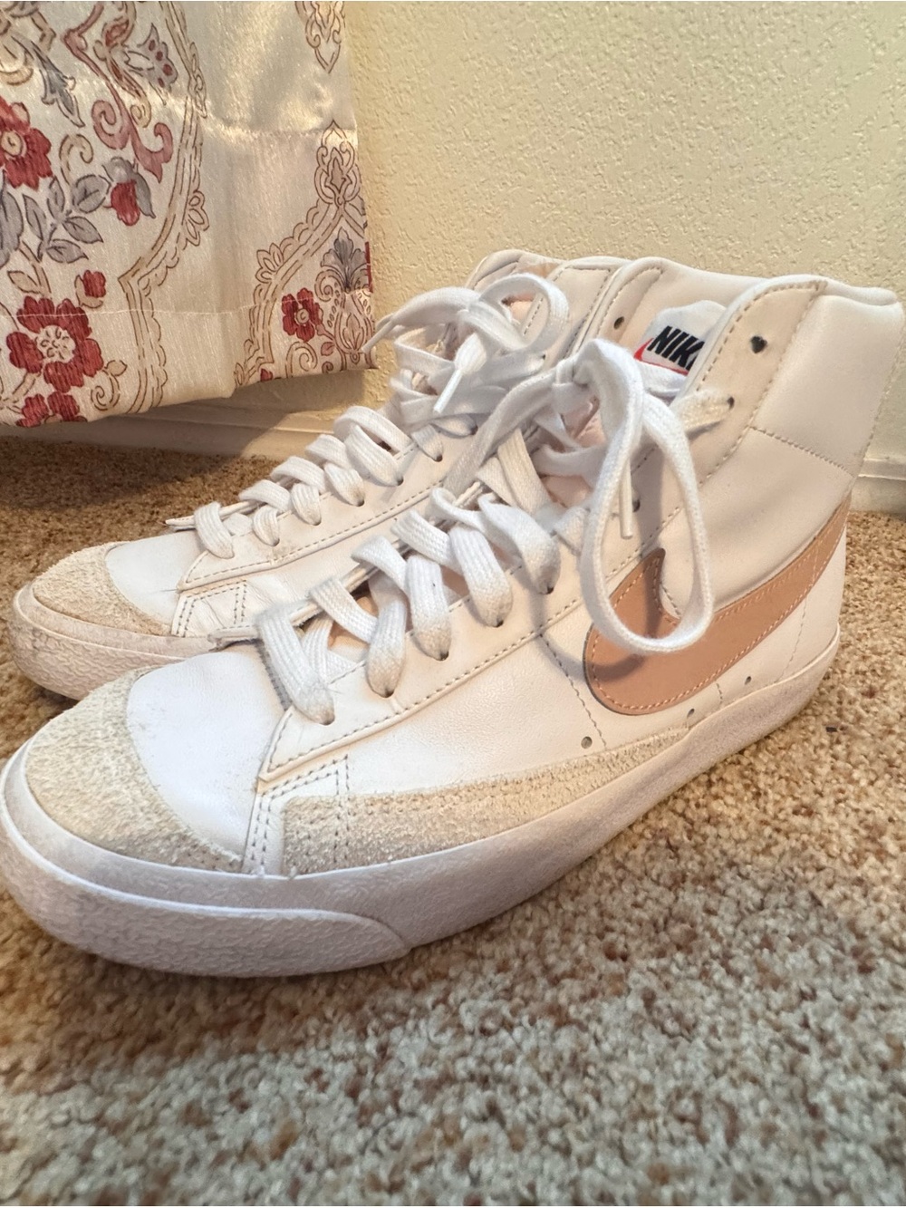 Nike Women's White High-Top Sneakers with Pale Pink Swoosh